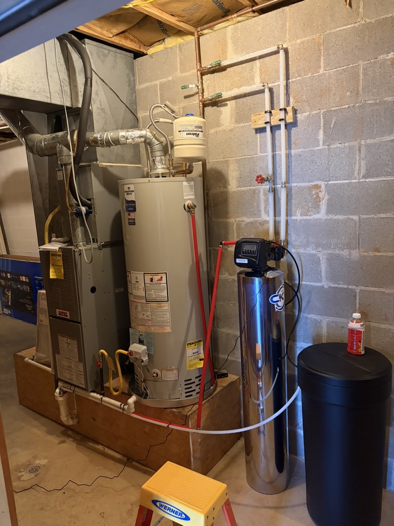 Completed whole-home water filtration, softener, water heater, and updated piping installation in Bentonville, Arkansas.