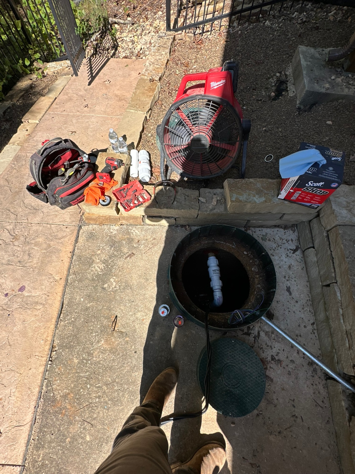Completed sewer grinder pump installation by United Plumbing at a Bella Vista, Arkansas home.