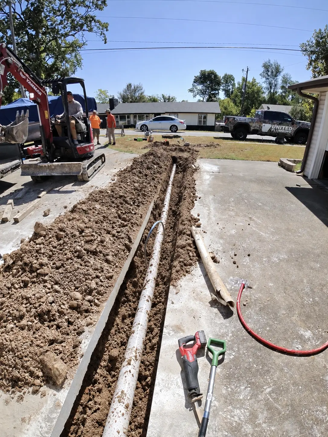 Completed water service line installation by United Plumbing in Bentonville, Arkansas.